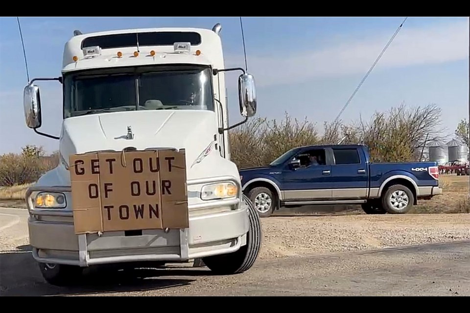 Dozens of vehicles were part of the protest Sunday at the shuttered school in Richmound where QAnon’s Romana Didulo is camped out with her supporters. 