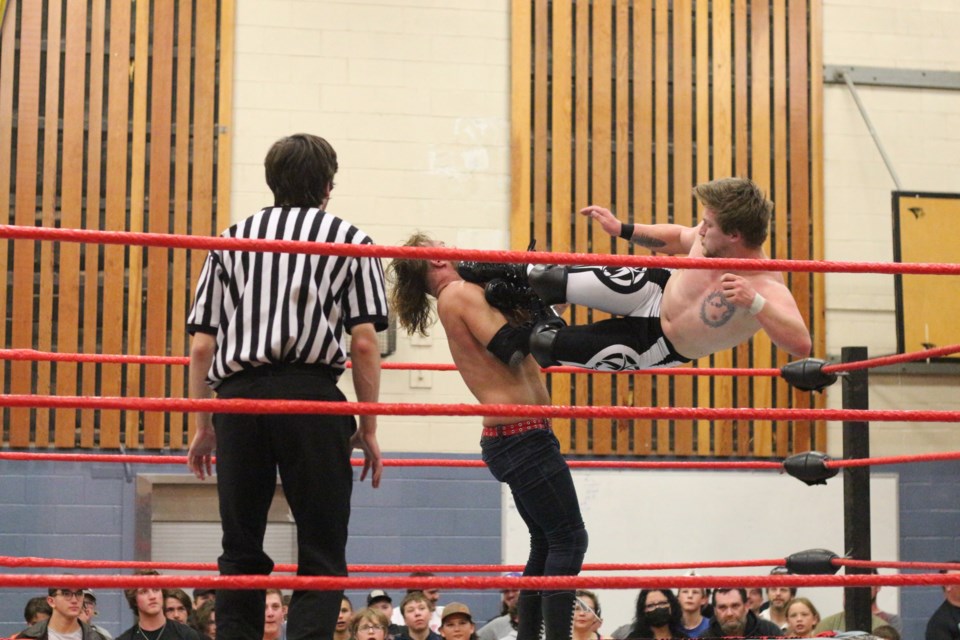 Tyler James on the receiving end of a dropkick delivered by Tyler Adams.