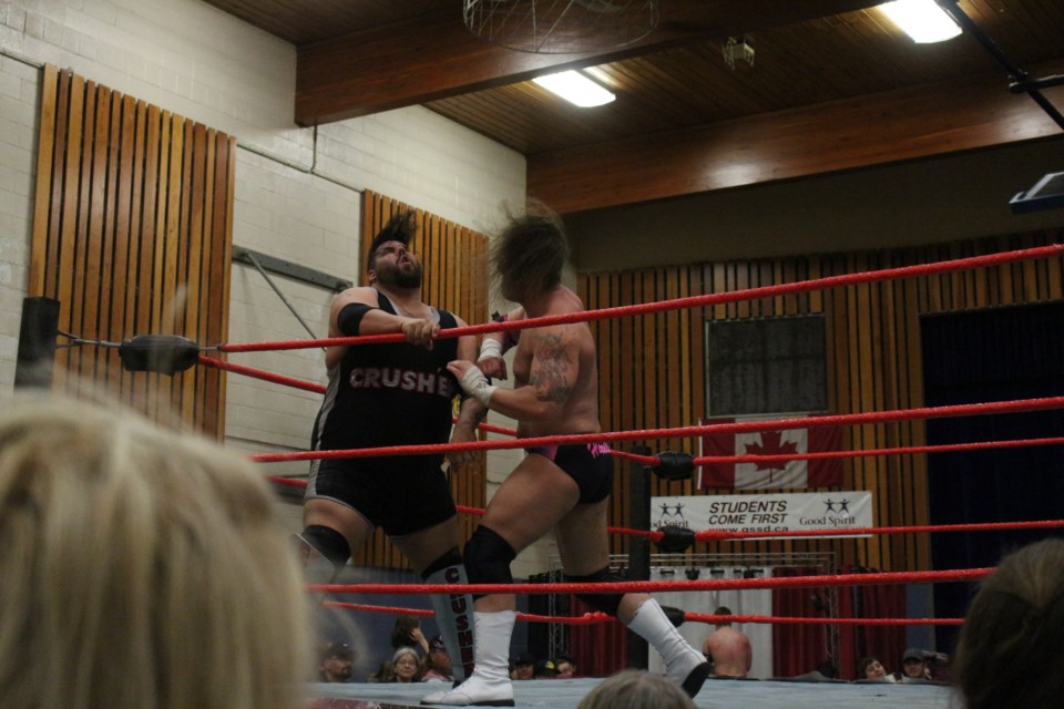  "The Canadian Crusher" AJ Sanchez vs. "The Headline" Shaun Martens.  Sanchez was the winner of the 10 Man Over the Top Rumble for Ron. 