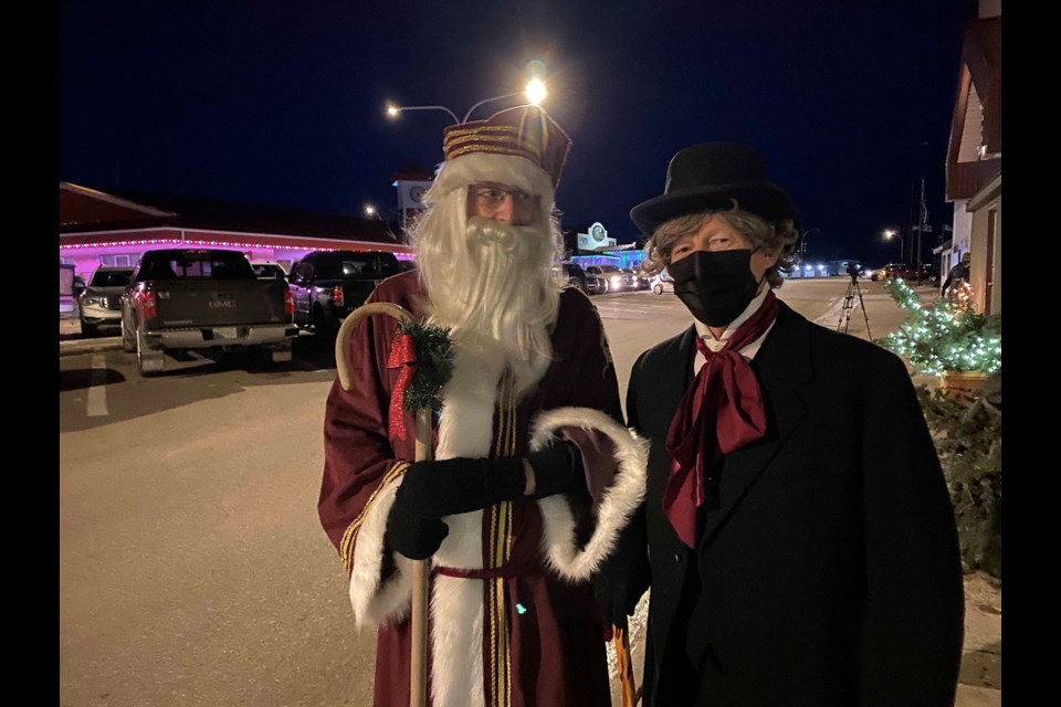 Ebenezer Scrooge had a visit from Santa Claus at the festival.