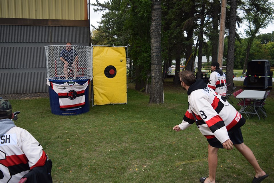 The Canora Cobras hosted a dunk tank at the Live & Play Street Festival on Aug. 19, with Cal Homeniuk, team general manger, first on the “hot seat.” Defenseman Tanner Denesowych was eager to take his shot at the target. When he missed his first throw, Homeniuk tried to get in his head and yelled, “You’re gonna get cut Denesowych!” 