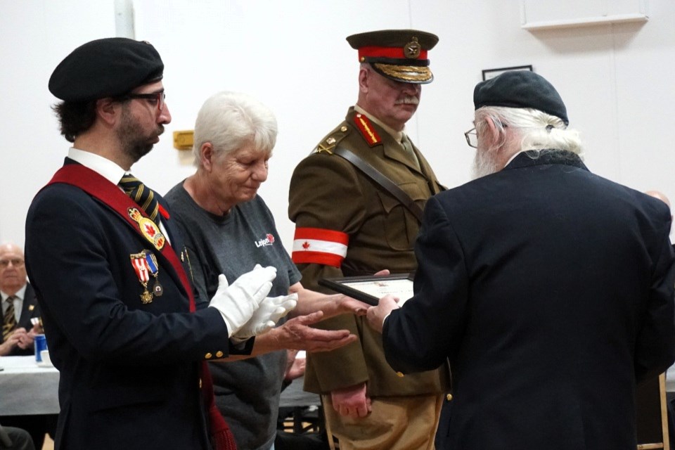 A special surprise was saved for comrades Dianne Allen and Captain Craig Bird, who were both awarded life memberships