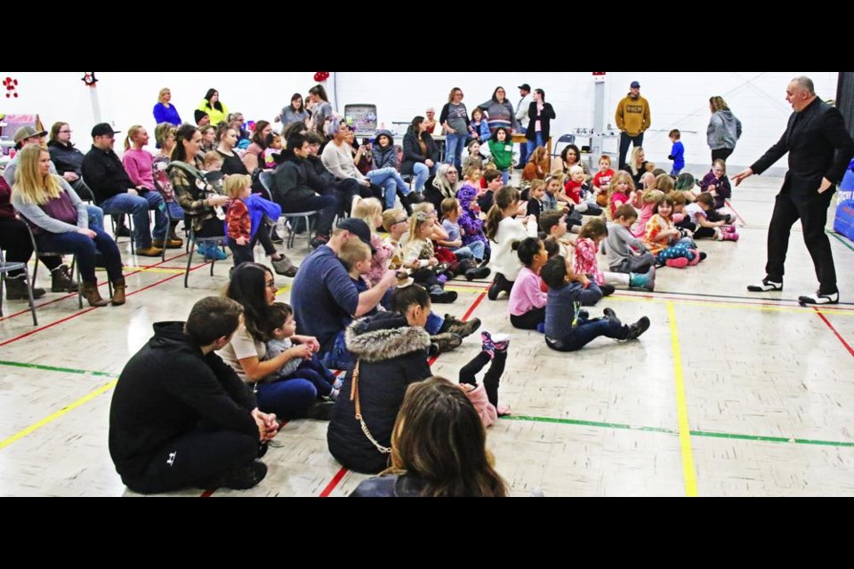 Young children and their parents were entertained with a magic show by Richy Roy, before playing carnival games at the family fun night held on New Year's Eve at the Knox Hall.