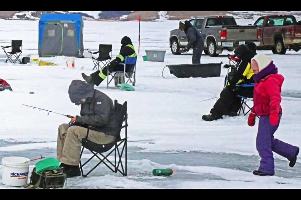 Participants in the fish derby patiently waited for a fish to bite onto their lure on Sunday afternoon at Mainprize Regional Park.