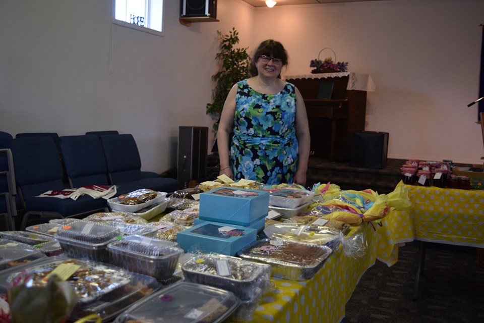 BettyAnn Regehr made sure everyone found what they were looking for at the food section of the Mother’s Day Tea & Bake/Plant Sale hosted by Gateway Community Church on May 13. Among the homemade goodies and treats available were: an assortment of cookies, saskatoon and raspberry peroshki, cottage cheese peroshki, a variety of pies, blueberry and cherry cheesecake, chocolate cherry buttercream cupcakes, raspberry jelly and more.