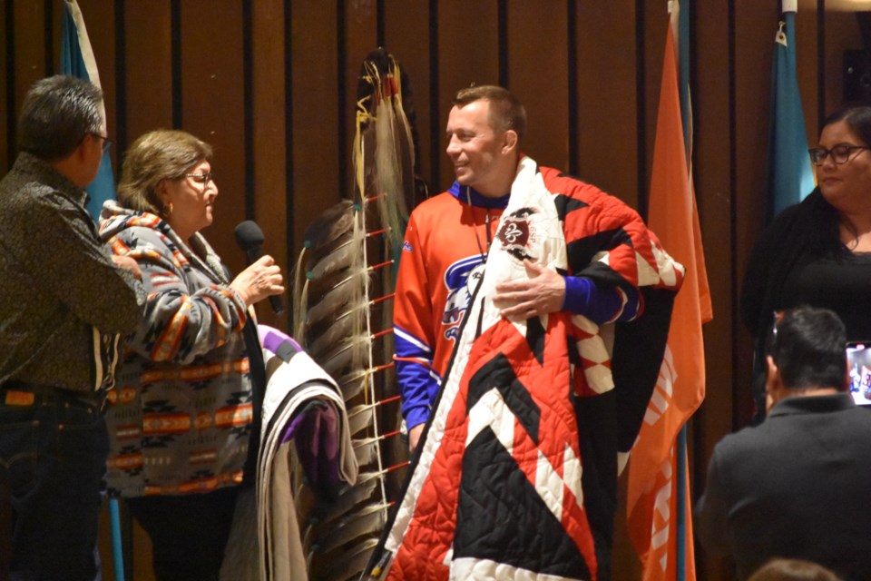 Brenda Kakakaway spoke to St. Pierre about the inspiration he had on her late grandson, in honour of this she gave him a handmade blanket.