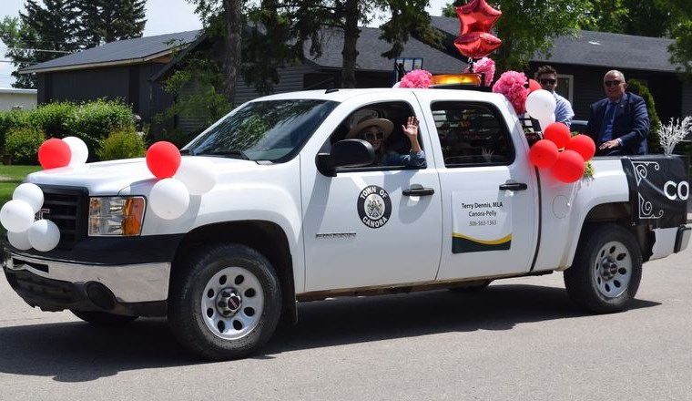 The Canora Composite School graduation celebration kicked off with a parade through Canora on June 29. Riding on the back of the lead vehicle, driven by Brandi Zavislak, were Mayor Mike Kwas and Terry Dennis, Canora-Pelly MLA.