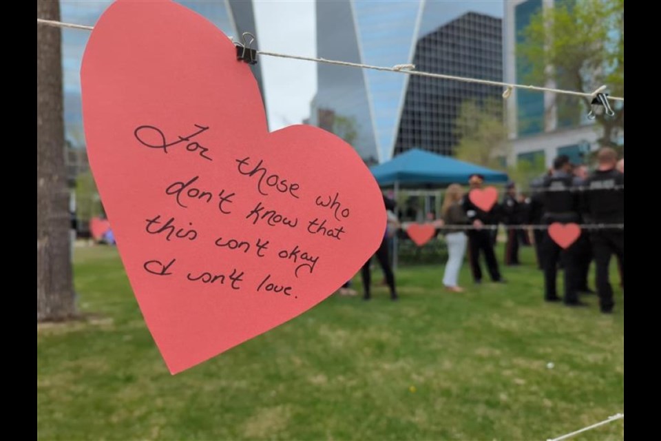 Paper hearts hang in Victoria Park during the Hearts in the Park event on May 14, as community members gathered to honour victims and survivors of violence and promote awareness during Victims and Survivors of Crime Week.