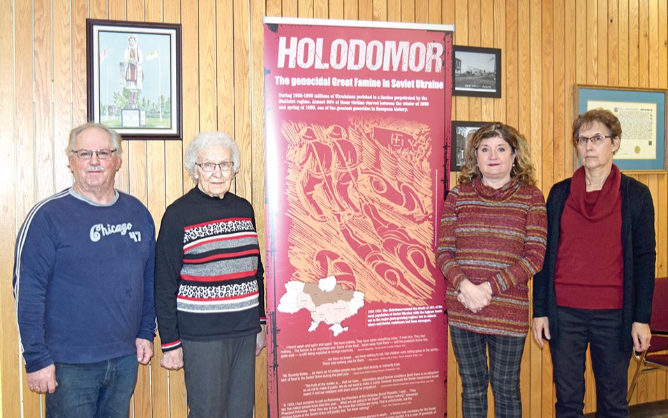 During Holodomor Week, a banner detailing this man-made catastrophe in the Ukraine was on display at the Canora Town Office to mark the 90th anniversary of this tragedy. Gathering for a photo on Nov. 21, from left, were representatives of the Canora Ukrainian Heritage Museum: Harold Woloschuk, vice-president; Dorothy Korol, treasurer; and Councillor Denise Leslie and Audrey Hrycak, volunteers.