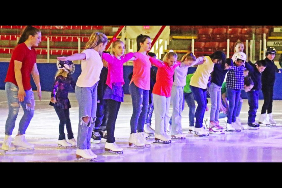 The large group of skaters performed to "We Found Love" by Rihanna, as the opening number for the ice showcase on Tuesday.