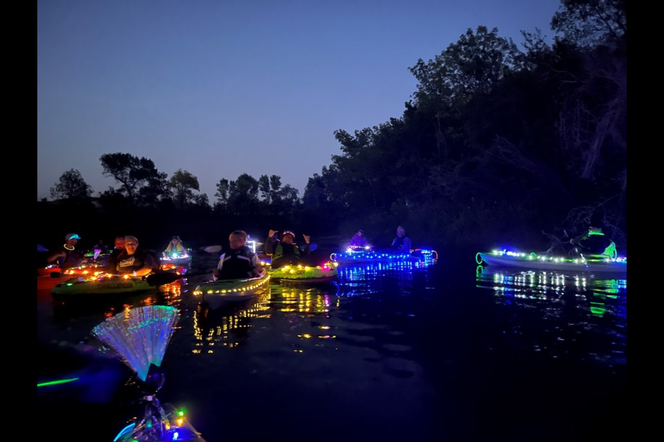 People decorated their kayaks, stand-up paddleboards, boats and inflatable floats with lights and travelled down the river in the Estevan area.