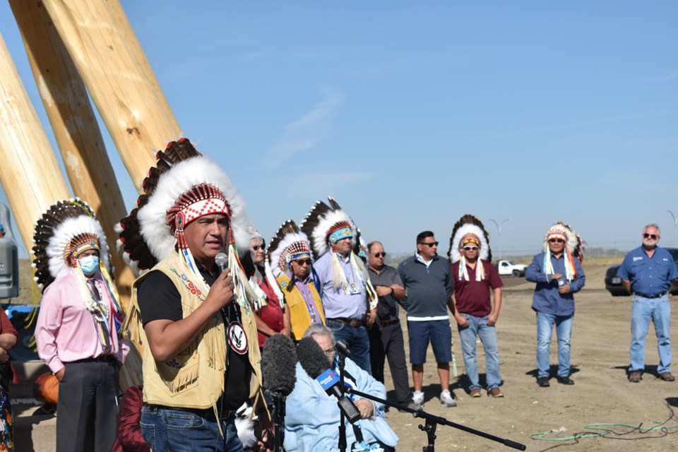 Kahkewistahaw First Nation Chief Evan Taypotat, left, explains the plans that are in place in developing the 40-acre area of land near the Saskatoon airport.