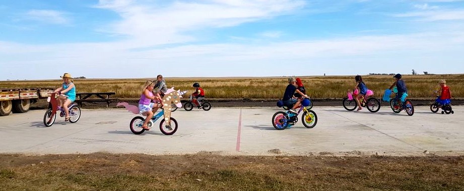 About 20 young riders partook in a bike parade in Macoun. 