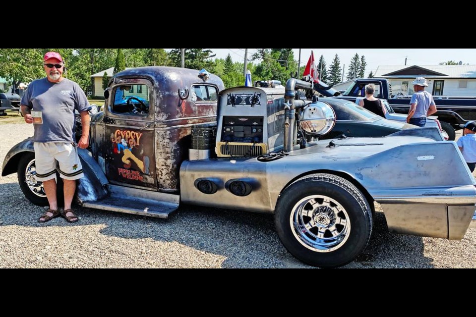 Lenny Martindale of Oxbow shows his 1937 Chevy Maple Leaf car, the people's choice winner