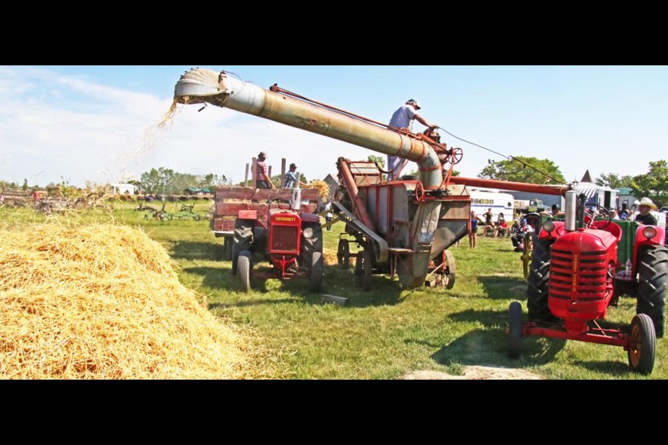 The antique Case thresher produced a pile of chaff from the threshing demonstration put on Saturday for Midale's Pioneer Echoes.