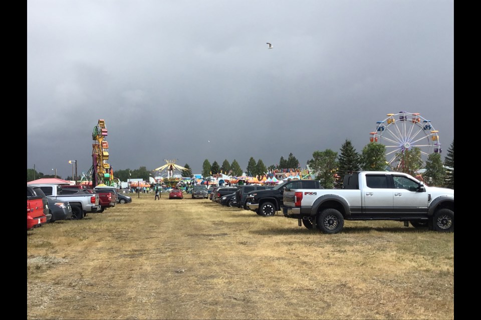 The midway is on at the Ag Society grounds.