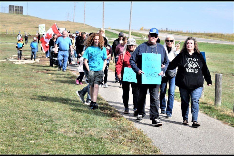 One Million March for Children participants walked the pathway to and from the Estevan Comprehensive School. 
