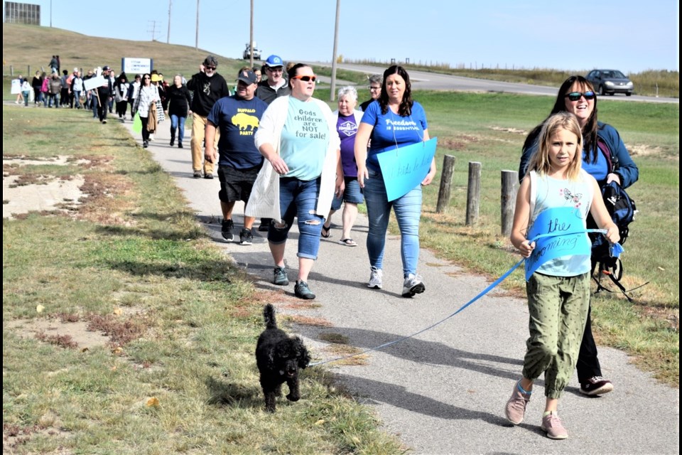 One Million March for Children participants walked the pathway to and from the Estevan Comprehensive School. 
