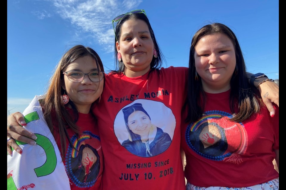 Ashley Morin's sister Janine, centre, with Janine's daughters Dacey, left, and Allyesha.