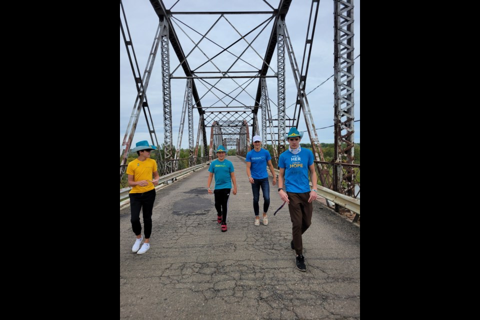 The participants in the Walk for Hope took their walk to the old bridges. 