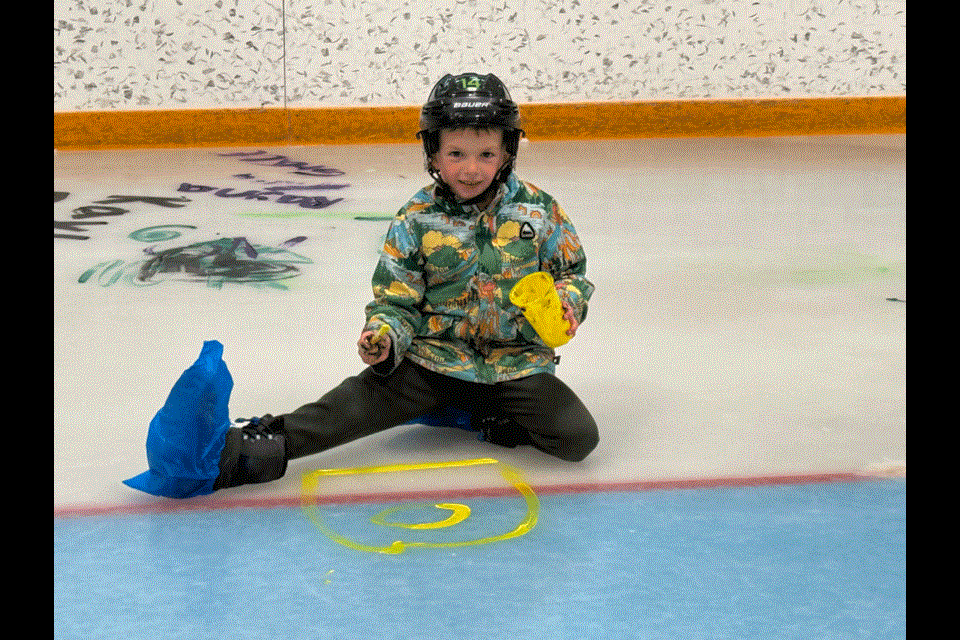 Six-year-old Bohdi Burton enjoyed painting SpongeBob SquarePants on the ice surface in the Arcola rink. 