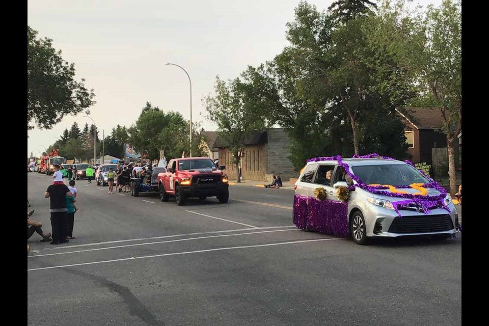 The parade down 100th Street, North Battleford.