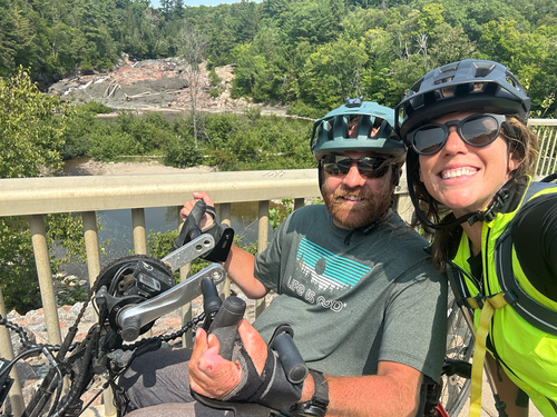 Kevin Mills and Nikki Davenport are seen bicycling across Canada for accessibility awareness.