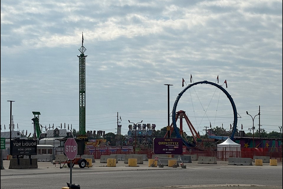 The midway skyline is already up on the REAL District grounds for the Queen City Ex.