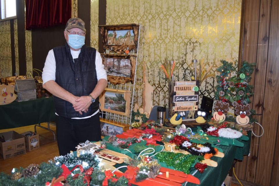 Eugene Tretiak of Pine Star Creations in Rama makes one-of-a-kind items out of wood and other raw materials. On December 11 he displayed his unique Christmas-themed creations at Rainbow Hall in Canora, for all the shoppers in the area who were still looking for a memorable Christmas gift. / Rocky Neufeld
