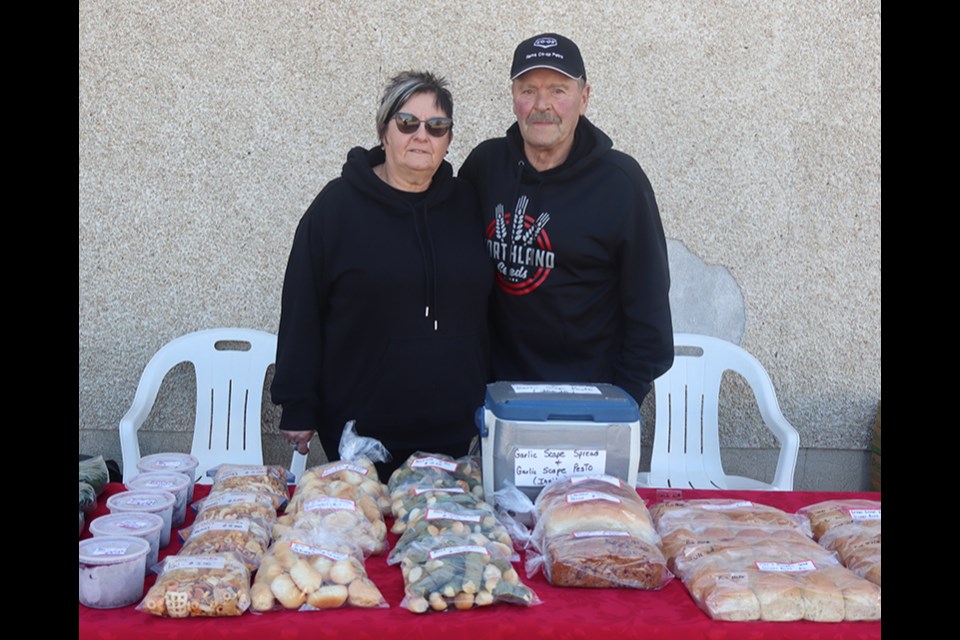 Rama’s Bev and Ken Kowalchuk shared produce from their garden such as dill bunches, beets and horseradish, as well as homemade snacks, bread, beet rolls and garlic spread.