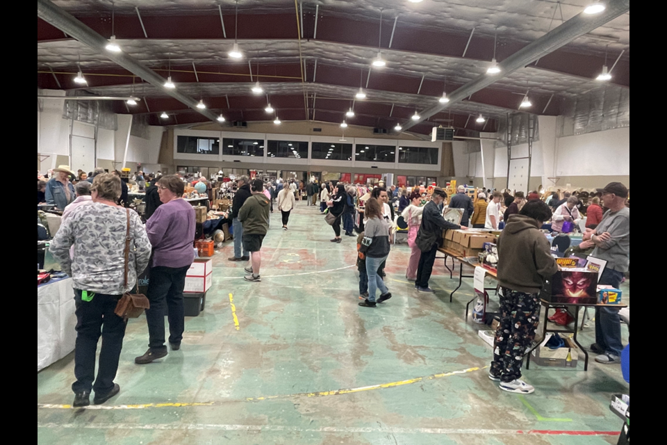 Hundreds of people looked around the various booths at the market.