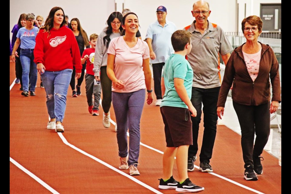 The Gervais family walked together at the Relay for Cancer fundraiser on Friday night.