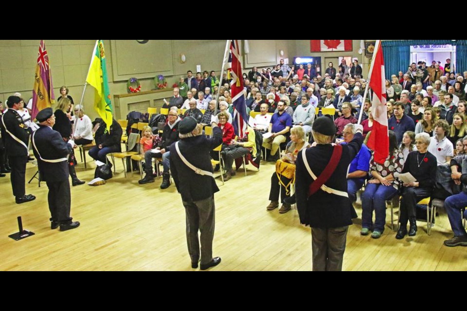 The Legion Colour Guard were the first in to the Remembrance Day service, and removed the colours at the end of the service in the Weyburn Legion Hall.