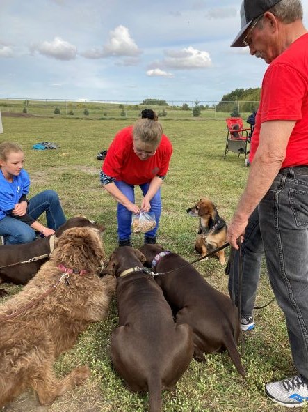 Larry Johnstone, from 4-Diamonds Kennels & Obedience, interacts with attendees at the Paw Park 10th anniversary event Sept. 11.