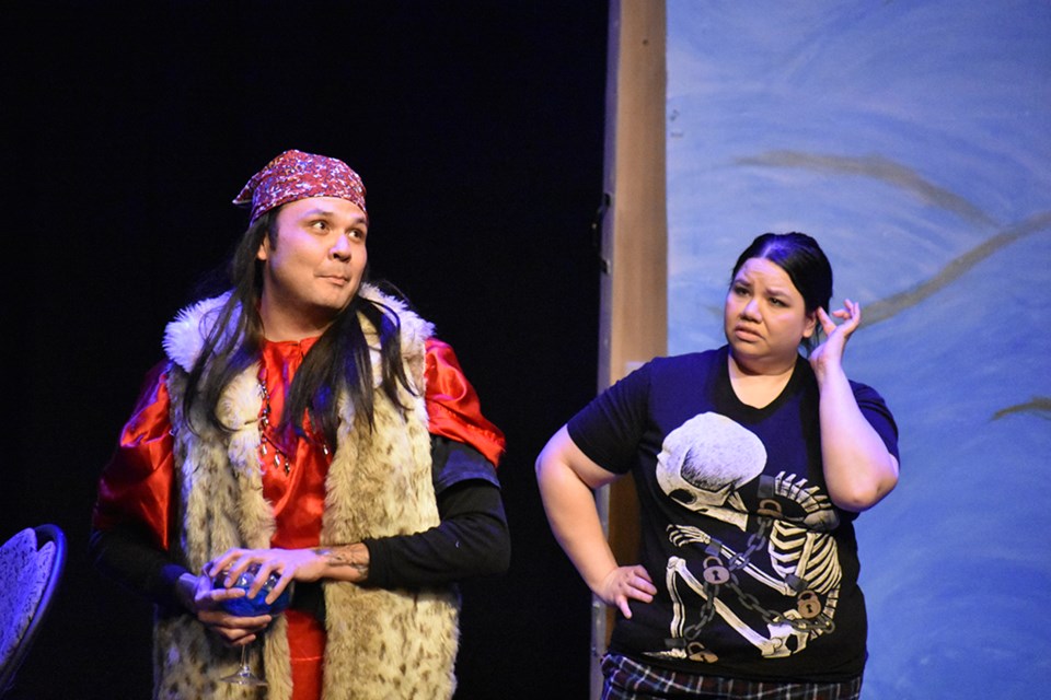 Mrs. Purdy Parsimonious listens to the spirit of the south chide her on her stingy, scrooge-like ways during the Dekker Centre's Dec. 1 showing of A Rez Christmas Carol.