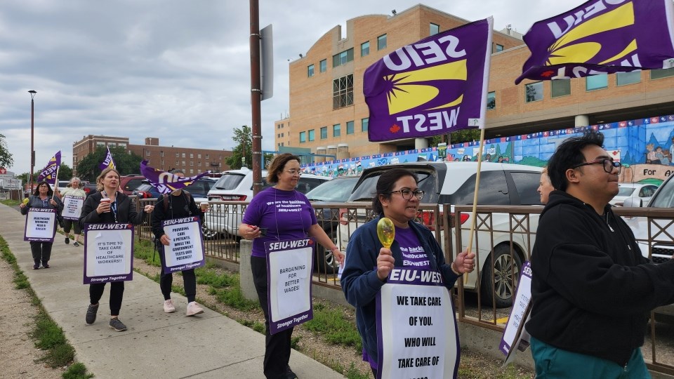 Some SEIU West members from St. Paul's Hospital took their break to join the information picket. 
