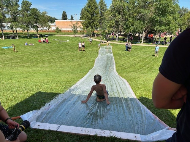 Sunshine and water sliding was the perfect fit Aug. 19 in a free, fun family event offered by Saskatoon Fire Department.