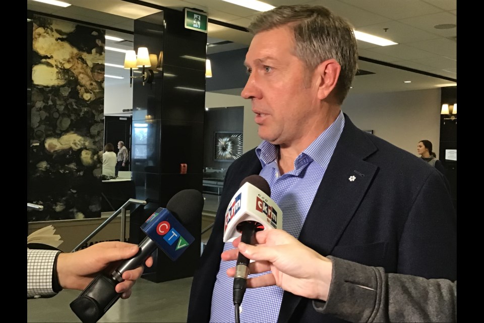 Sheldon Kennedy speaks to reporters at Agribition.