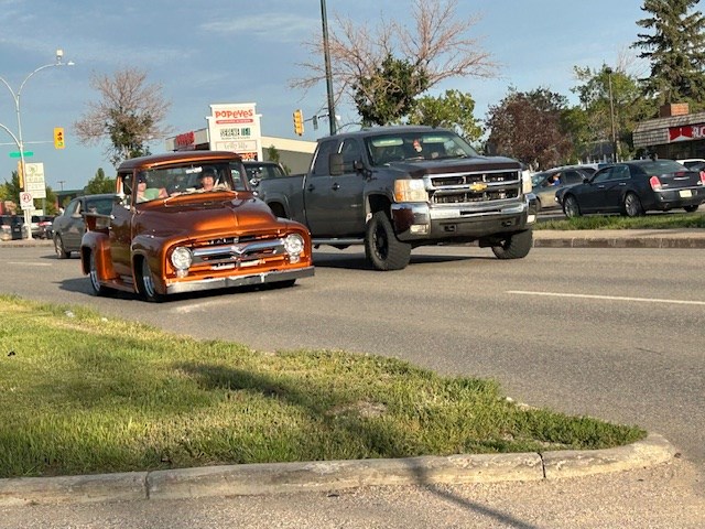 side-by-side-old-truck-new-truck-cruise-night