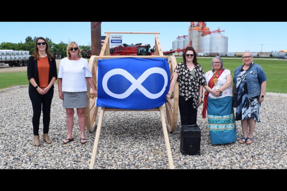 From left, Rebecca Foord, Brenda Olson, Melanie Memory, Linda Sopp and Marg Friesen participated in the dedication.
