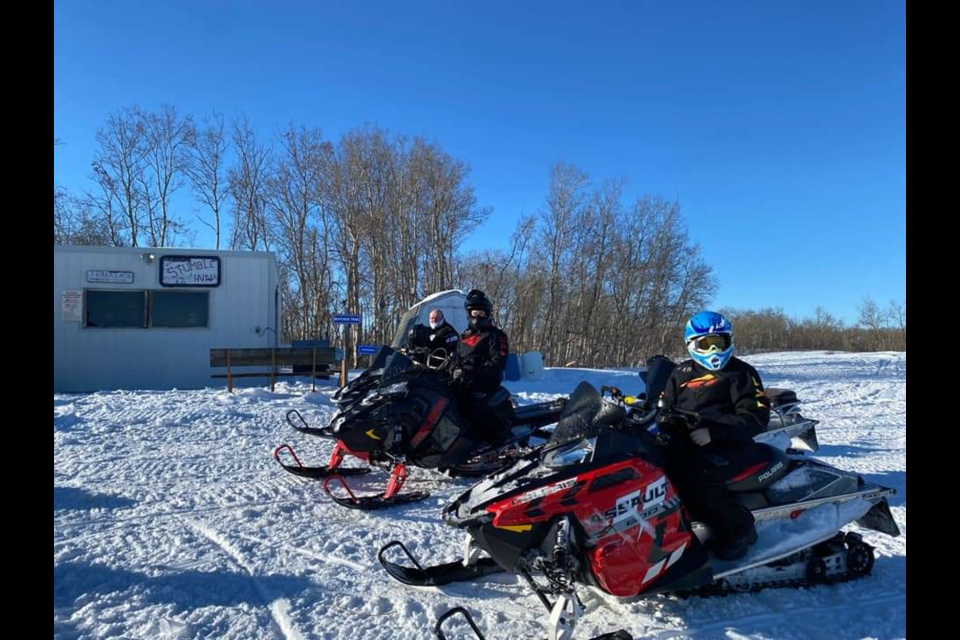 Among the Trakkers members who enjoy getting out on the trails with their sleds, from back to front, are: Rob, Rylan and Colton Bletsky.