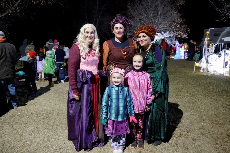 Shyra and Zalia Carlson stopped for a picture with the Sanderson sisters at Southern Plains Co-op's interpretation.                               
