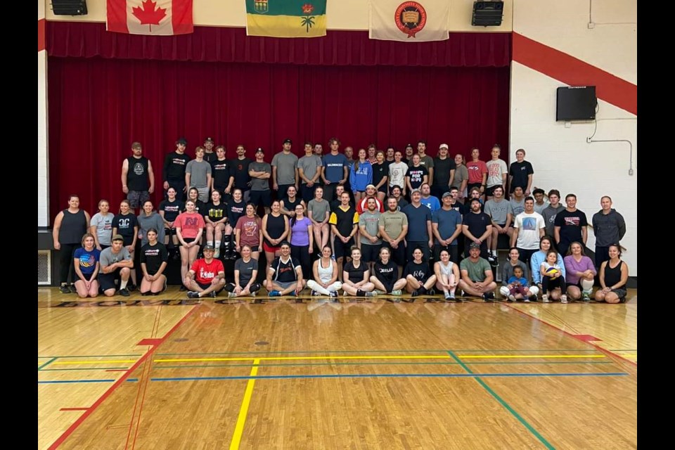 Vice-principal, and longtime volleyball coach, Ken Parker, was proud to take a snapshot of the players and be part of the fifth UCHS alumni Tyler Zunti Memorial Volleyball Tournament.