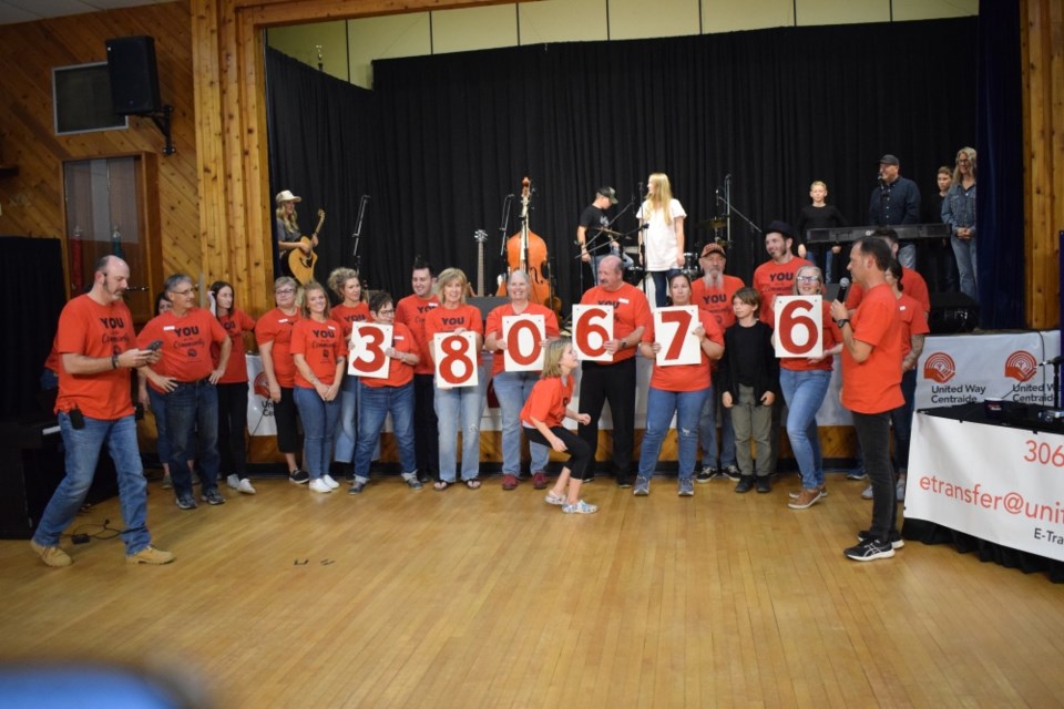 The United Way Estevan board and others celebrate after a record-setting Telethon.