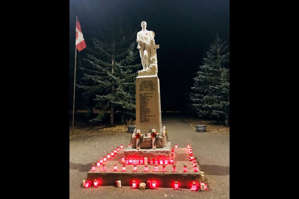 Volunteers have placed candles on the path leading up to this Cenotaph in Unity as well as on the base as tribute to veterans and those who are serving as part of Remembrance Day recognition.