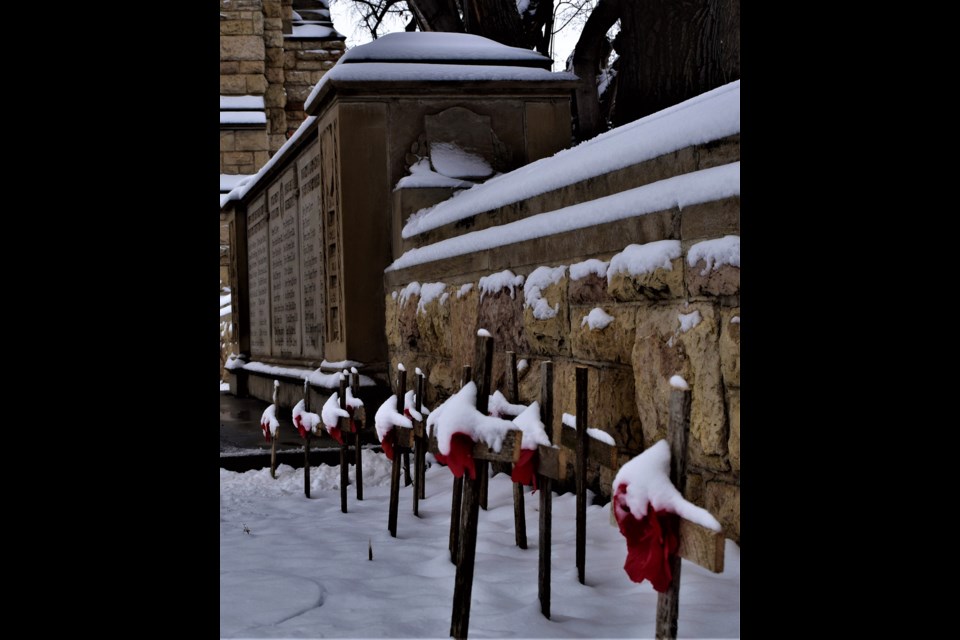 Crosses representing students, faculty, staff, and alumni of the university who perished while in the line service.