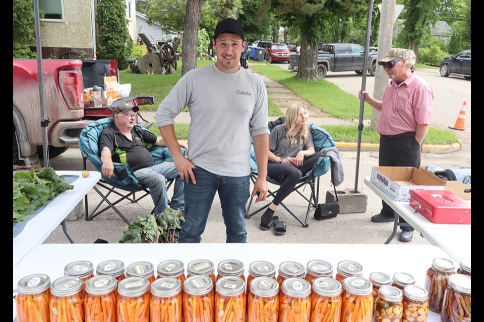 Among the vendors lining Main Street during the Canora Homecoming and Street Festival on Aug. 16 was Nick’s Pick’s, where Nick Dmitriuk of Canora carried a variety of pickled foods: carrots, garlic, beans, eggs, and eggs and bacon.