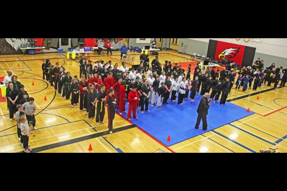 Grand Master Harold Vilcu emceed the opening ceremonies, as over 200 competitors from 21 clubs lined up in the Eagle gym to start the day-long International Martial Arts Championships on Saturday.