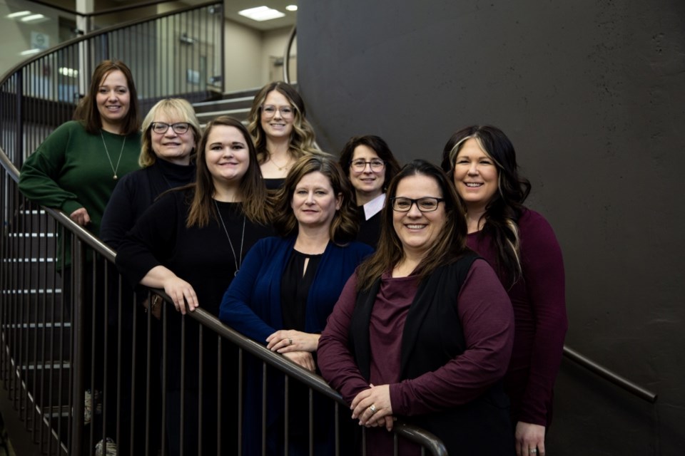 The organizing committee for the СƵeast Women of Distinction Awards. 