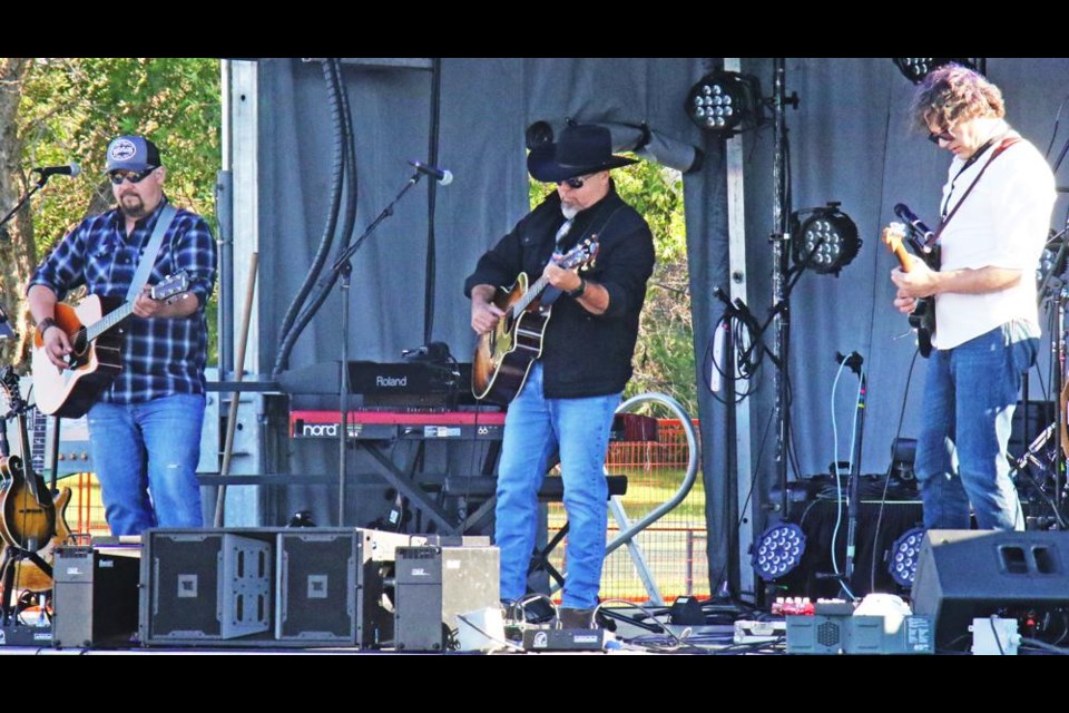 Weyburn singer-songwriter Dan Cugnet, shown at the Young Fellows centennial concert last June, is up for three SCMA Awards, including his two albums, and for Emerging Artist of the Year.